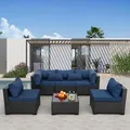 Rattaner 6-piece navy blue all-weather wicker sectional with glass table