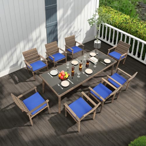 Rattaner 7-piece brown wicker patio dining set with royal blue cushions